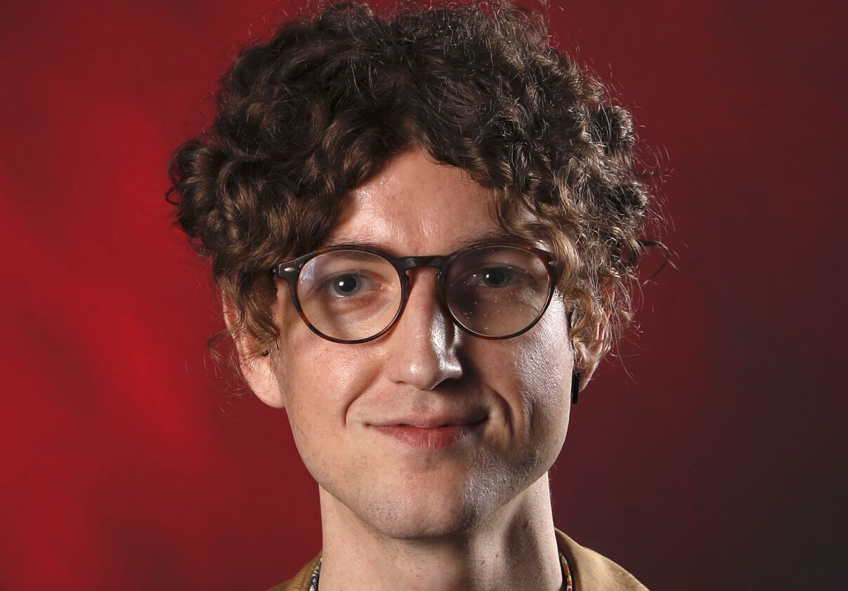A journalist's headshot.